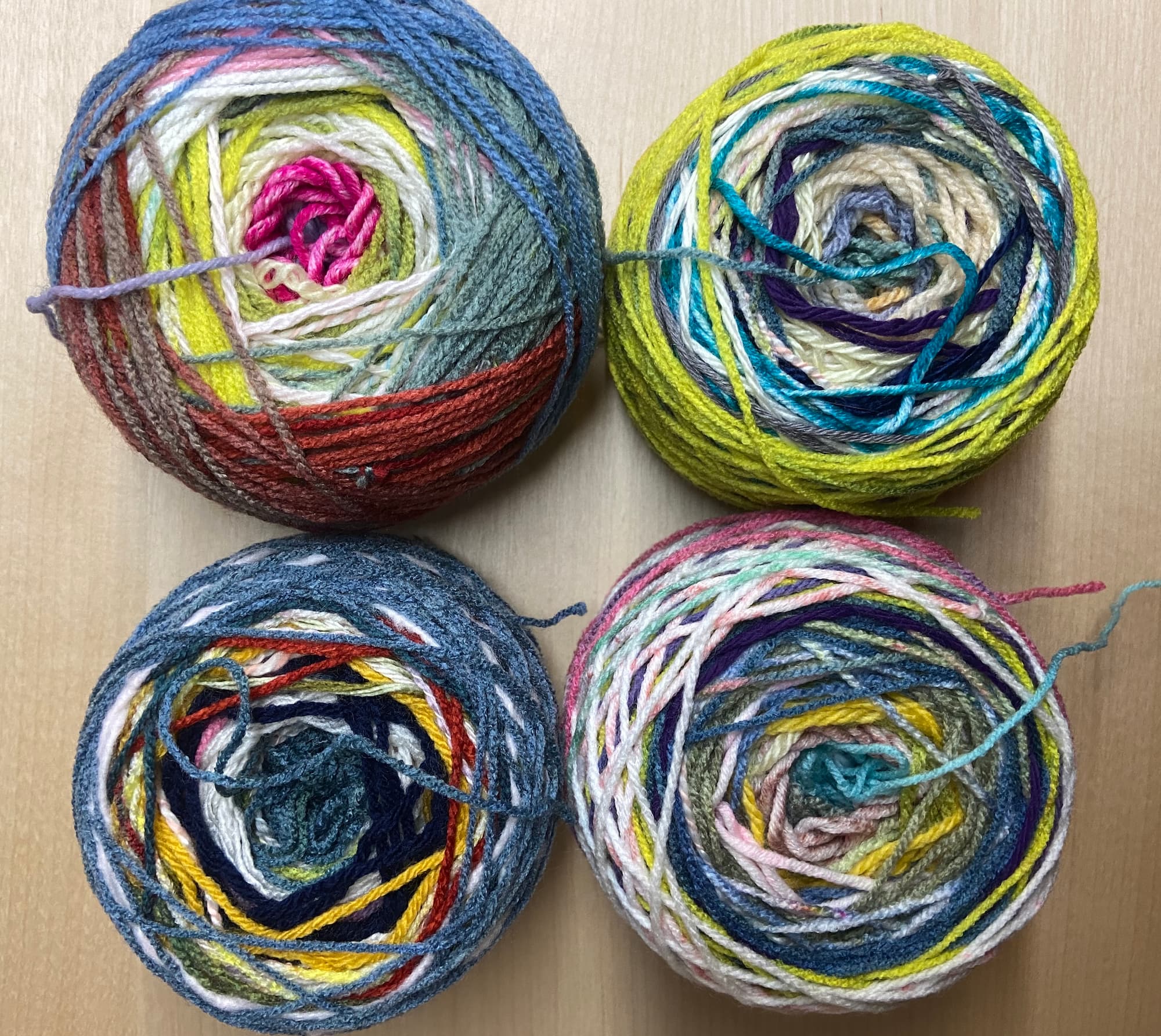 scrap_dk_cakes.jpgfour yarn cakes made with joined yarn scraps